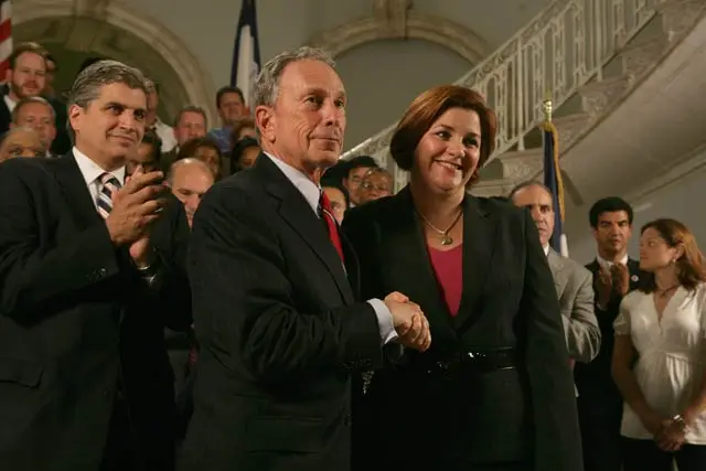 Photograph of Mayor Bloomberg and City Council Speaker Quinn shaking on the budget deal from the NYC Mayor's Office